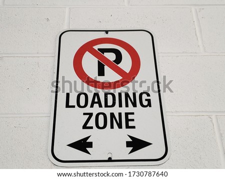 No Parking and Loading Zone Sign on the wall