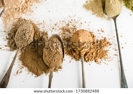 Ayurvedic cosmetic ubtan for face and hair care. vegetable ingredients ground into a powder Royalty-Free Stock Photo #1730882488
