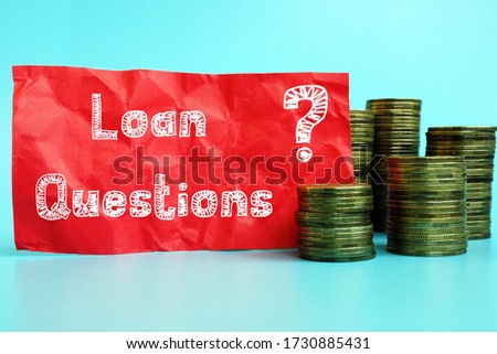Financial concept about Loan Questions with sign on the piece of paper.