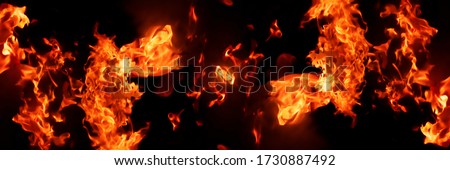 Panorama Fire flames on black background. fire burst texture for banner backdrop.