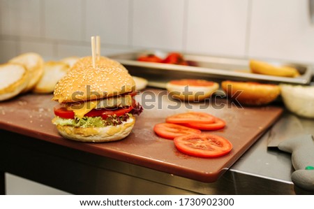 Homemade burger with chicken and vegetables