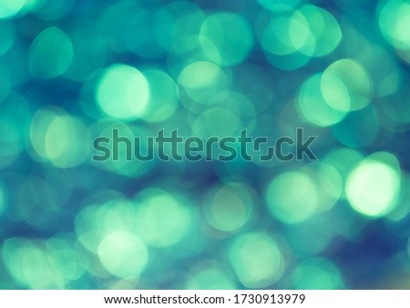 abstract green with blue bokeh background 