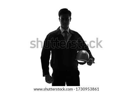 Silhouette of young engineer. Industrial occupation. Royalty-Free Stock Photo #1730953861