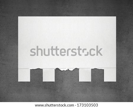 torn paper for ads on a concrete background