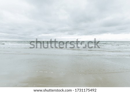 Summer sea with blue water wave, Denmark. Outdoor tropical summer sea paradise. Heavenly view of the deep transparent ocean. Calm turquoise water.