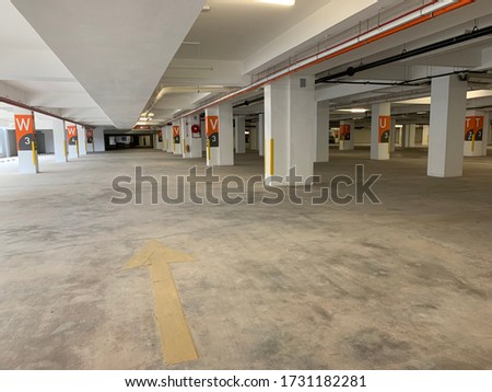 Pictures shows the perspective of an empty car park in a newly constructed building