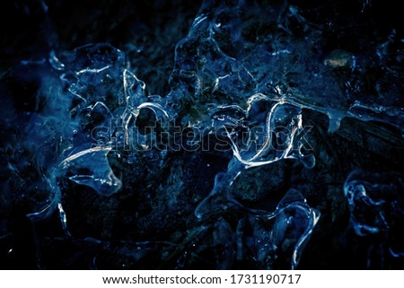 closeup of ice with silhouette