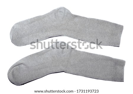 pair of socks gray-brown color on a white background