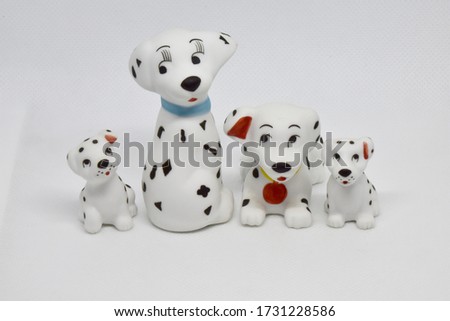 Closeup of The dog's stucco doll isolated on white background.