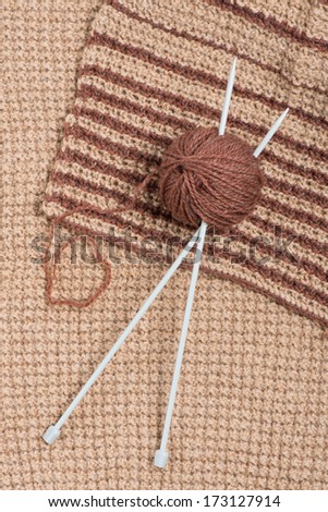 Detail of woven handicraft knit woolen design texture and knitting needle.