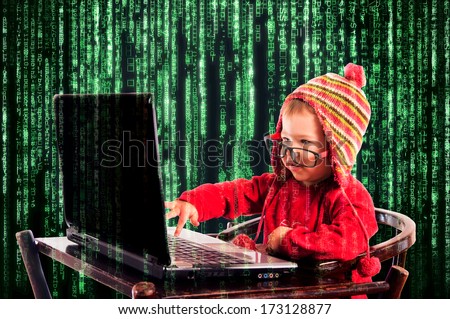 Little child typing on the keyboard.Selective focus on the child Royalty-Free Stock Photo #173128877