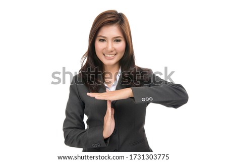 Young business Asian woman showing time out sign with hands and blank copy space area for text or slogan,portrait of beautiful Asian woman,isolated on white background