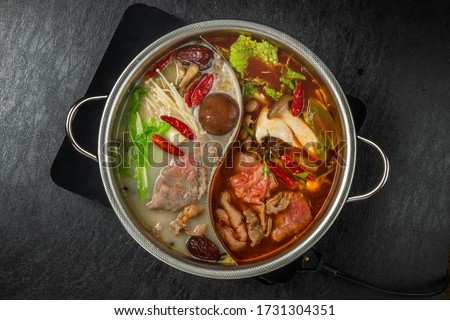 Chinese hotpot and exclusive pan Royalty-Free Stock Photo #1731304351