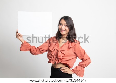 Young Asian woman with white blank sign on white background