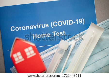 Coronavirus Covid-19 home testing kit with swab and test tube Royalty-Free Stock Photo #1731446011