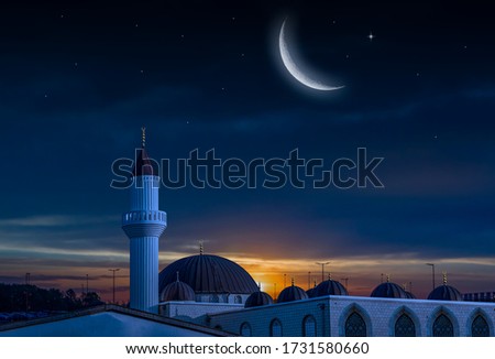 Night sky and moon. Mosque against the background of sunset Royalty-Free Stock Photo #1731580660