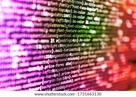 Abstract screen of web developer. Web abstract programming and created virus on laptop screen. Closeup of Java Script and HTML code. The concept of modern technology and site development