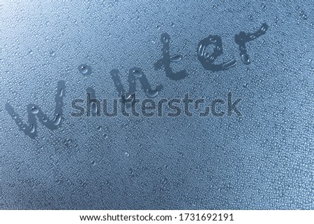 Winter symbol in neon light background drops copy space