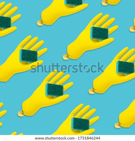 Yellow latex gloves pattern.  Cleaning gloves on blue background. 