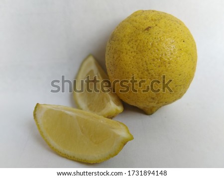 Lemon is fresh yellow and contains properties