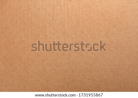 Brown paper texture. Cardboard background.