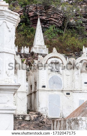 Beautiful view to white byzantine style tomb stones mountain cemetery