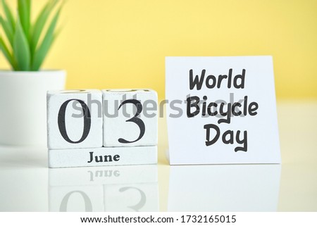 World Bicycle Day 03 third june Month Calendar Concept on Wooden Blocks. Close up.