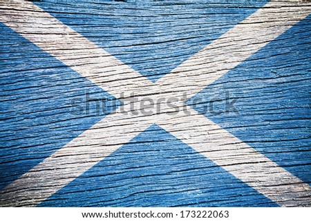  Scotland Flag painted on old wood plank texture 