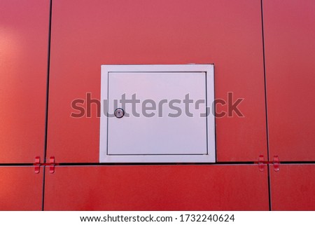 small hatch for electricians in the ventilated facade