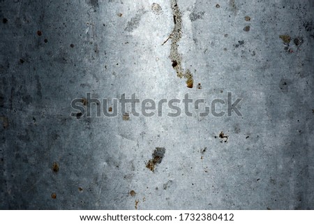The surface of metal plates with rust stains are used for the background.
