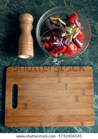 Vegetables on the board, salad for breakfast. Selective focus image.                                     