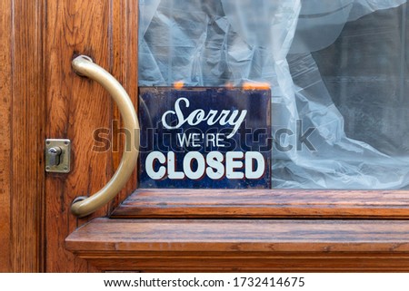 Sorry, we are closed - board on cafe/ restaurant/shop window, closed shut down business during coronavirus pandemic, covid-19 outbreak. Lockdown, isolation, small business bankruptcy concept. 