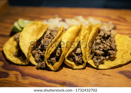 Delicious beef tacos with onion and lemon