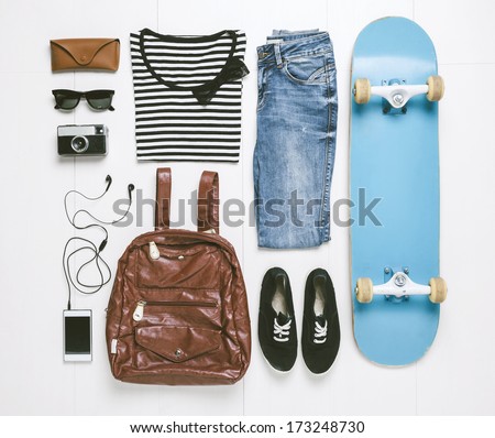 Outfit of casual woman./  Overhead of essentials skater woman.  Royalty-Free Stock Photo #173248730