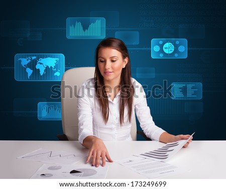 Businesswoman doing paperwork with futuristic digital backgroung