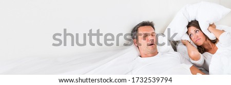 Snoring Man Sleeping With Apnea And Sleepless Woman Royalty-Free Stock Photo #1732539794