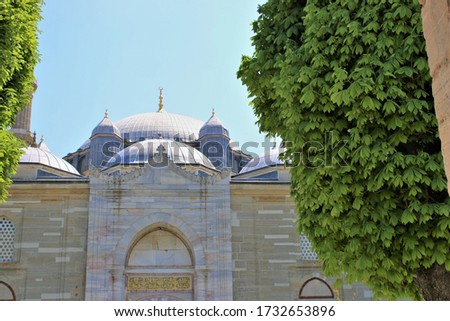 Minarets,dome and the mosque.blue sky background