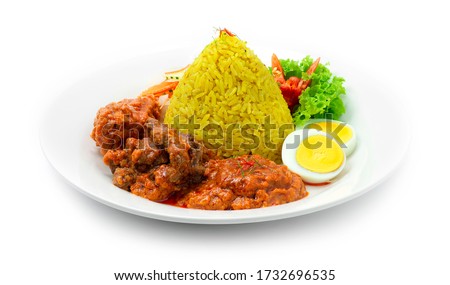 Nasi Tumpeng Mini (Ayam, daging) Rice with Chicken, Beef Rendang and boiled egg Authentic Traditional Indonesia, Malaysia Food Style Famous dish red curry Asian recipe decorate Kaffer,chili  Royalty-Free Stock Photo #1732696535