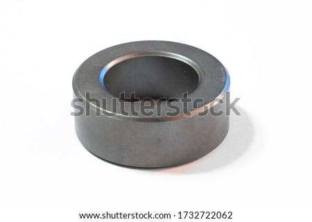 Ferromagnetic ring isolated on white background Royalty-Free Stock Photo #1732722062