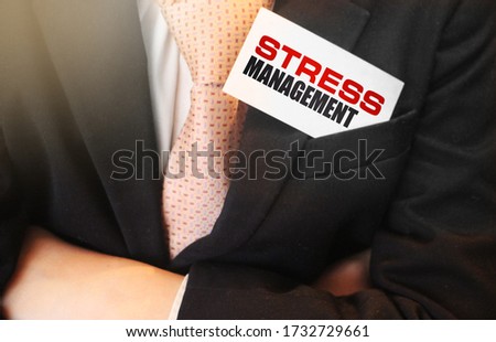 Stress Management on card in Businessman upper pocket. Stressfull business crisis concept.