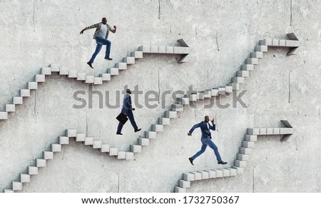 Image of businessman walking upstairs