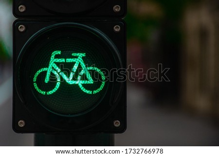 Sustainable transport. Bicycle traffic signal, green light, road bike, free bike zone or area, bike friendly