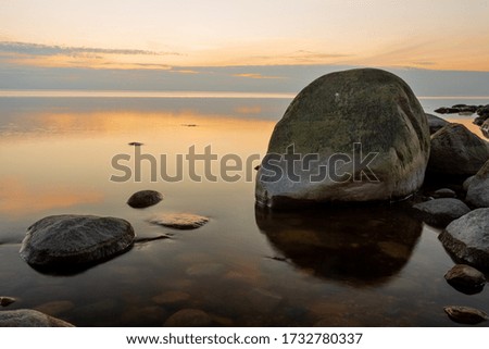 City Tuja, Latvia. Baltic sea with rocks and sunshine. Travel photo.