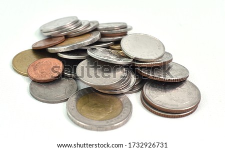 Coin heap Isolated from white background