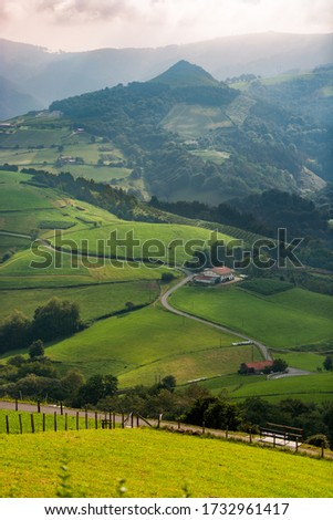 View of the green meadows and mountains near Aia, Gipuzkoa, Spain Royalty-Free Stock Photo #1732961417