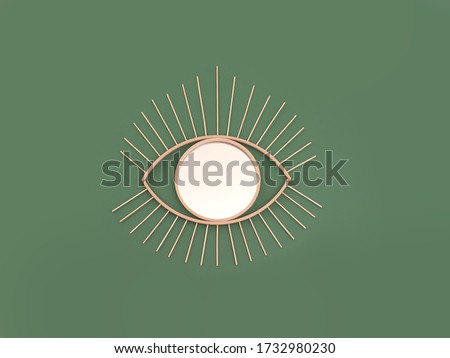 Wooden mirror in eye shape as a bohemian style wall decoration object on green background 