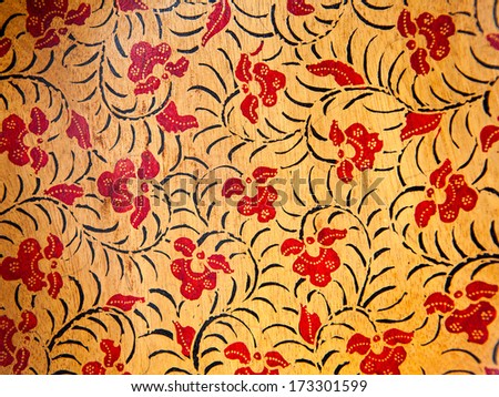 Fragment of colorful retro tapestry pattern with floral ornament useful as background