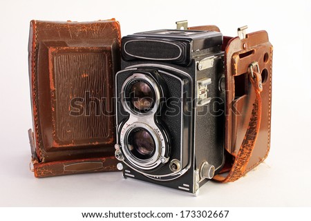 Antique Twin Lens Medium Format Camera with extremely worn but classic leather case. 