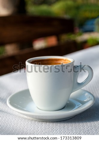 Aroma brown coffee on white dish background