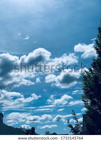 This is a photo of sunny and bright sky with clouds.